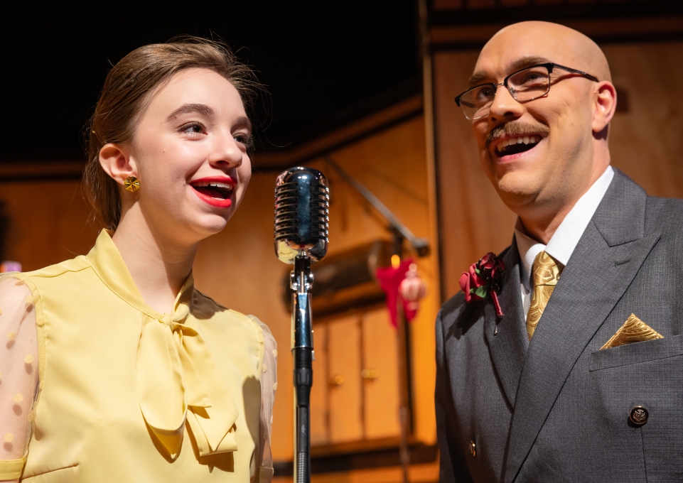 Two student actors in It's a Wonderful Life: A Live Radio Play